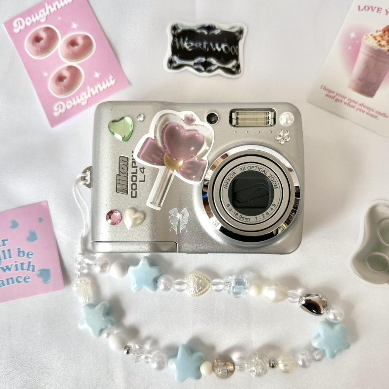 Nikon Coolpix L4 ⋆ ˚。⋆౨ৎ˚