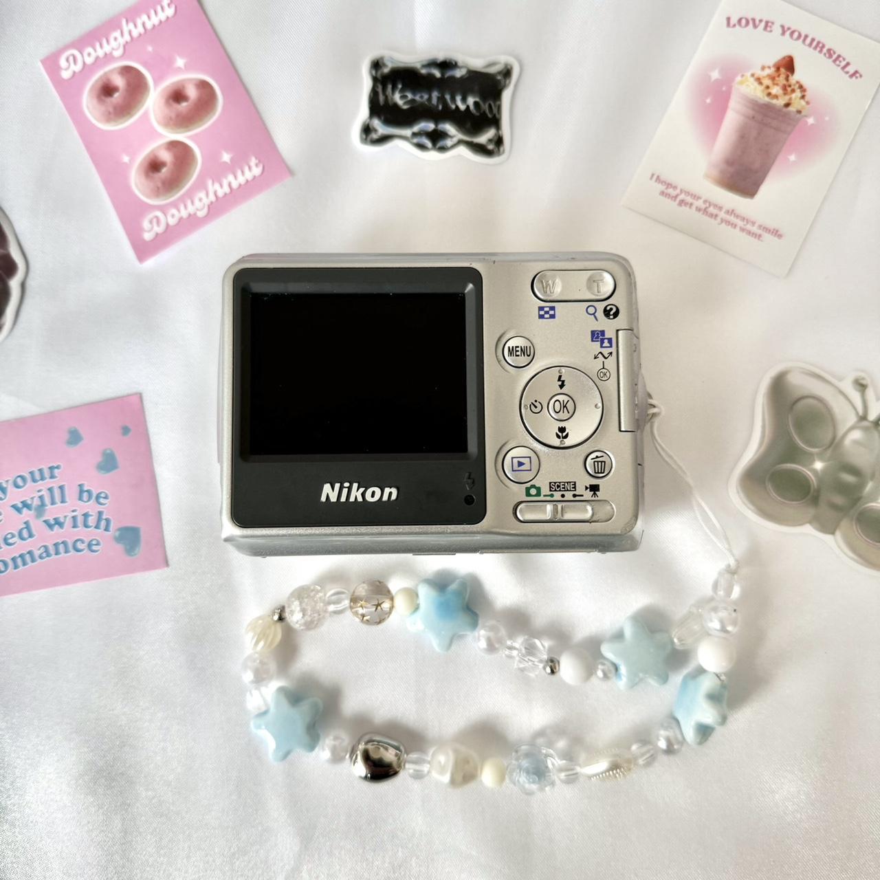 Nikon Coolpix L4 ⋆ ˚。⋆౨ৎ˚