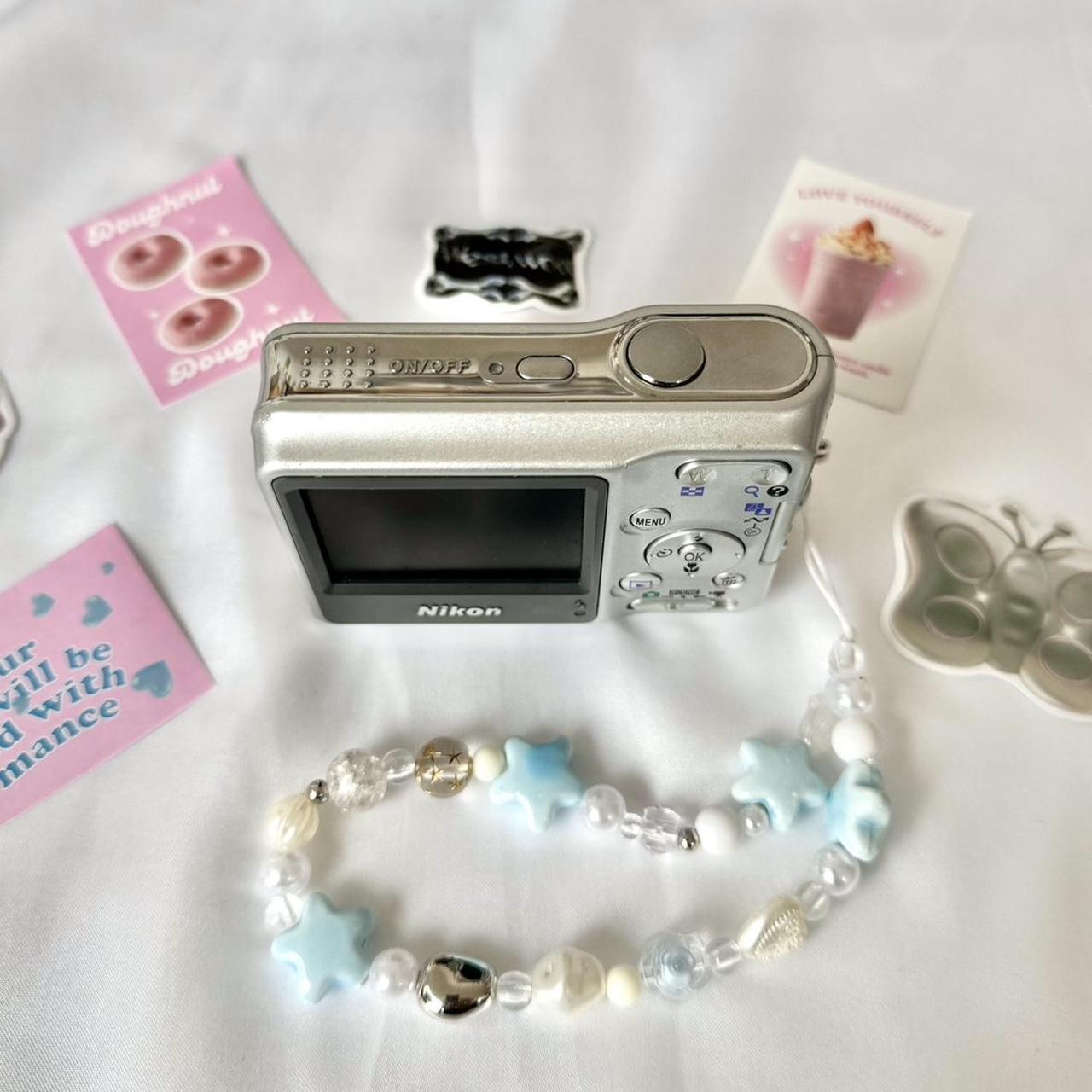 Nikon Coolpix L4 ⋆ ˚。⋆౨ৎ˚